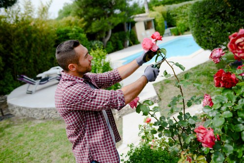 Gardening team caring for a landscaped garden in Aperfield